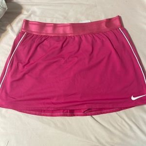 medium pink Nike golf/tennis skirt